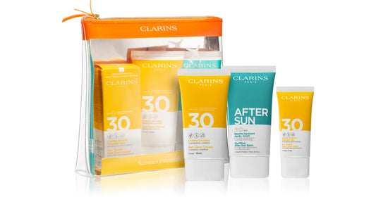 Clarins Essential Sun Care Travel Set 50ml Very High Protection Sun CreamSPF50 - 15ml Gentle Peeling - 75ml Soothing After Sun Balm