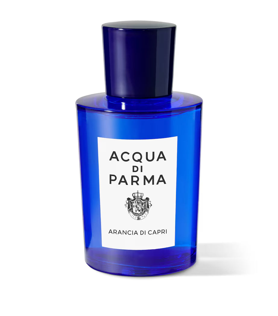 Blue Acqua di Parma perfume bottle on a white background
