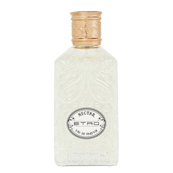 A rectangular frosted glass perfume bottle with an embossed floral pattern, a gold-toned cap, and a circular black-and-white label reading 'RECIET ETRO EAU DE PARFUM'.