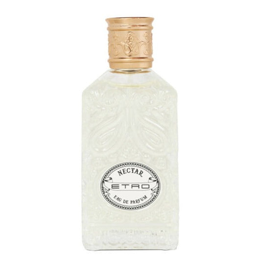 A rectangular frosted glass perfume bottle with an embossed floral pattern, a gold-toned cap, and a circular black-and-white label reading 'RECIET ETRO EAU DE PARFUM'.